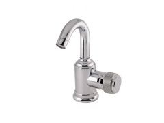 Single lever bidet mixer with decorated brass ring 