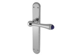 Door lever handles set on plates with lapislazuli stone