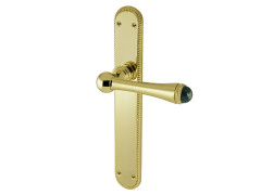 Door lever handles set on plates with malachite stone