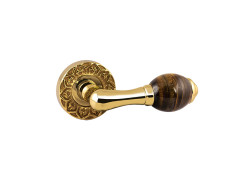 Door lever handles set on roses with tiger eye stone