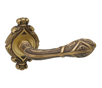 Door handle on rosettes Clasica